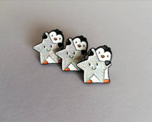 Load image into Gallery viewer, Little penguin and star pin. Penguin glitter enamel pin.