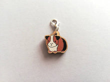 Load image into Gallery viewer, Guinea pig stitch marker, mini wooden cavy, ethically sourced wood, tri colour guinea pig charm