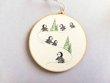 Load image into Gallery viewer, Little wooden penguin decoration. Playing in the snow Christmas ornament, eco friendly wood. Penguin chicks