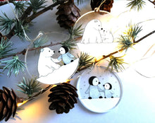 Load image into Gallery viewer, Penguin and polar bear decoration. Little recycled acrylic Christmas ornament, penguin and bear in the snow, eco friendly
