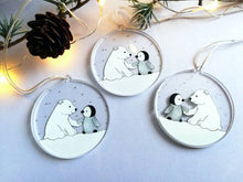 Load image into Gallery viewer, Penguin and polar bear decoration. Little recycled acrylic Christmas ornament, penguin and bear in the snow, eco friendly