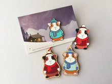 Load image into Gallery viewer, Guinea pig Christmas little decorations. Ethically sourced eco friendly. Choice of blue or red. Cute Christmas tree ornaments.
