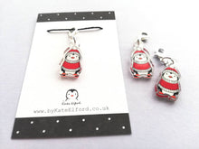 Load image into Gallery viewer, Penguin stitch marker, red hat and jumper, penguin recycled acrylic charm