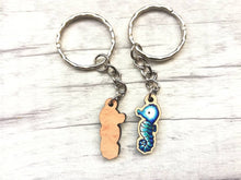 Load image into Gallery viewer, Tiny seahorse keyring, mini seahorse wooden key fob, ethically sourced wood, seaside key chain, coastal bag charm