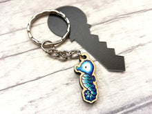 Load image into Gallery viewer, Tiny seahorse keyring, mini seahorse wooden key fob, ethically sourced wood, seaside key chain, coastal bag charm