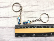 Load image into Gallery viewer, Tiny seahorse keyring, mini seahorse wooden key fob, ethically sourced wood, seaside key chain, coastal bag charm