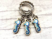 Load image into Gallery viewer, Tiny seahorse keyring, mini seahorse wooden key fob, ethically sourced wood, seaside key chain, coastal bag charm