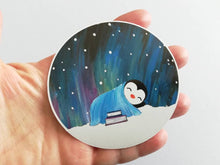 Load image into Gallery viewer, Penguin asleep under the stars sticker, Northern lights, aurora reading, book sticker
