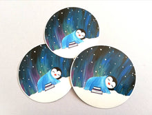 Load image into Gallery viewer, Penguin asleep under the stars sticker, Northern lights, aurora reading, book sticker