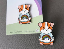 Load image into Gallery viewer, Rainbow guinea pig enamel pin, piggy brooch. Pastel blue sky, cloud, rainbow and heart pin. Cavy pin