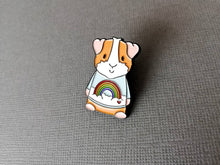 Load image into Gallery viewer, Rainbow guinea pig enamel pin, piggy brooch. Pastel blue sky, cloud, rainbow and heart pin. Cavy pin