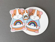 Load image into Gallery viewer, Rainbow guinea pig enamel pin, piggy brooch. Pastel blue sky, cloud, rainbow and heart pin. Cavy pin