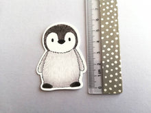 Load image into Gallery viewer, Penguin static window cling, little reusable windows and mirror decor, small cute penguin chick. Not a sticker