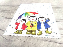 Load image into Gallery viewer, Rainbow penguin glasses, screen cleaner, penguins in the rain lens cloth, cute screen wipe, rainbow umbrella fabric screen wipe