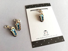 Load image into Gallery viewer, Seahorse stitch marker, mini blue seahorse wooden charm, ethically sourced wood, little crochet stitch marker