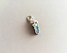 Load image into Gallery viewer, Seahorse stitch marker, mini blue seahorse wooden charm, ethically sourced wood, little crochet stitch marker