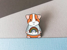 Load image into Gallery viewer, Rainbow guinea pig enamel pin, piggy brooch. Pastel blue sky, cloud, rainbow and heart pin. Cavy pin