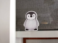 Load image into Gallery viewer, Penguin static window cling, little reusable windows and mirror decor, small cute penguin chick. Not a sticker