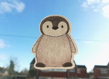 Load image into Gallery viewer, Penguin static window cling, little reusable windows and mirror decor, small cute penguin chick. Not a sticker