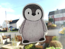 Load image into Gallery viewer, Penguin static window cling, little reusable windows and mirror decor, small cute penguin chick. Not a sticker