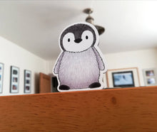 Load image into Gallery viewer, Penguin static window cling, little reusable windows and mirror decor, small cute penguin chick. Not a sticker