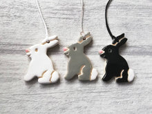 Load image into Gallery viewer, White, grey and black little pottery Easter bunny rabbits
