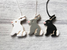 Load image into Gallery viewer, White, grey and black little pottery Easter bunny rabbits