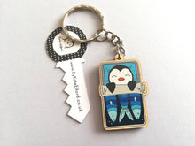 Load image into Gallery viewer, Penguin keyring, sleeping penguin sardine tin, lightweight wooden key fob, ethically sourced wood, penguin key chain, cute bag charm