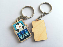 Load image into Gallery viewer, Penguin keyring, sleeping penguin sardine tin, lightweight wooden key fob, ethically sourced wood, penguin key chain, cute bag charm