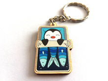 Load image into Gallery viewer, Penguin keyring, sleeping penguin sardine tin, lightweight wooden key fob, ethically sourced wood, penguin key chain, cute bag charm