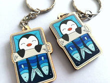 Load image into Gallery viewer, Penguin keyring, sleeping penguin sardine tin, lightweight wooden key fob, ethically sourced wood, penguin key chain, cute bag charm