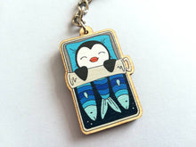 Load image into Gallery viewer, Penguin keyring, sleeping penguin sardine tin, lightweight wooden key fob, ethically sourced wood, penguin key chain, cute bag charm