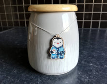 Load image into Gallery viewer, Penguin dressing gown Christmas decoration, eco friendly, ethically sourced wood, cute little tag, waiting for Santa