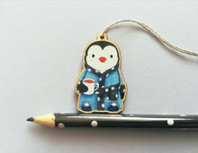 Load image into Gallery viewer, Penguin dressing gown Christmas decoration, eco friendly, ethically sourced wood, cute little tag, waiting for Santa