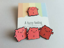 Load image into Gallery viewer, A fuzzy feeling enamel pin, cute glittery pin, positive enamel brooch, friendship, cuddly supportive enamel badges