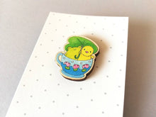 Load image into Gallery viewer, Frog and chick pin, eco friendly wooden teacup brooch, Responsibly resourced wood, eco friendly. Cute badge