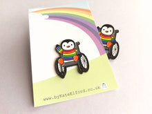 Load image into Gallery viewer, Penguin wearing a rainbow jumper, wheelchair enamel pin, penguin brooch