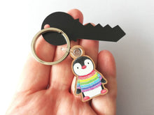 Load image into Gallery viewer, Rainbow penguin keyring, penguin rainbow jumper wooden key fob, ethically sourced wood, small penguin key chain, bag charm