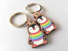 Load image into Gallery viewer, Rainbow penguin keyring, penguin rainbow jumper wooden key fob, ethically sourced wood, small penguin key chain, bag charm