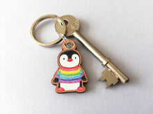 Load image into Gallery viewer, Rainbow penguin keyring, penguin rainbow jumper wooden key fob, ethically sourced wood, small penguin key chain, bag charm