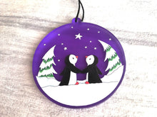 Load image into Gallery viewer, Penguin Christmas tree decoration. Frosted purple acrylic, penguins in the snow, tree Christmas ornament