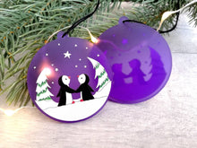Load image into Gallery viewer, Penguin Christmas tree decoration. Frosted purple acrylic, penguins in the snow, tree Christmas ornament