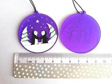 Load image into Gallery viewer, Penguin Christmas tree decoration. Frosted purple acrylic, penguins in the snow, tree Christmas ornament