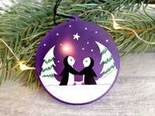 Load image into Gallery viewer, Penguin Christmas tree decoration. Frosted purple acrylic, penguins in the snow, tree Christmas ornament