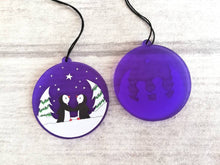 Load image into Gallery viewer, Penguin Christmas tree decoration. Frosted purple acrylic, penguins in the snow, tree Christmas ornament