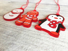 Load image into Gallery viewer, Penguin Christmas decorations. Set of three, frosted red acrylic penguin, snowman and gingerbread man. Cute Christmas tree ornaments.