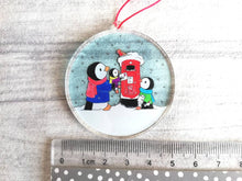 Load image into Gallery viewer, Penguins and postbox Christmas decoration. Recycled acrylic, cute Christmas tree ornament, eco friendly