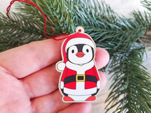 Load image into Gallery viewer, Penguin Santa decoration. Wooden Father Christmas ornament, responsibly resourced wood, Boo the penguin
