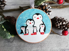Load image into Gallery viewer, Penguin family decoration. Wooden Christmas ornament, penguins in the snow, eco friendly wood