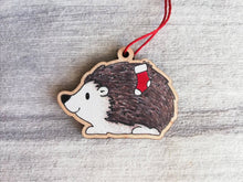 Load image into Gallery viewer, Hedgehog Christmas decoration. Hedgehog and stocking, small wooden, ethically sourced wood. Cute Christmas tree ornament